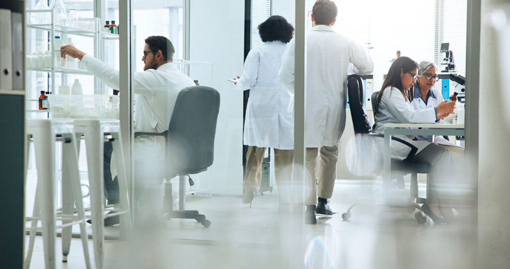 researchers in lab